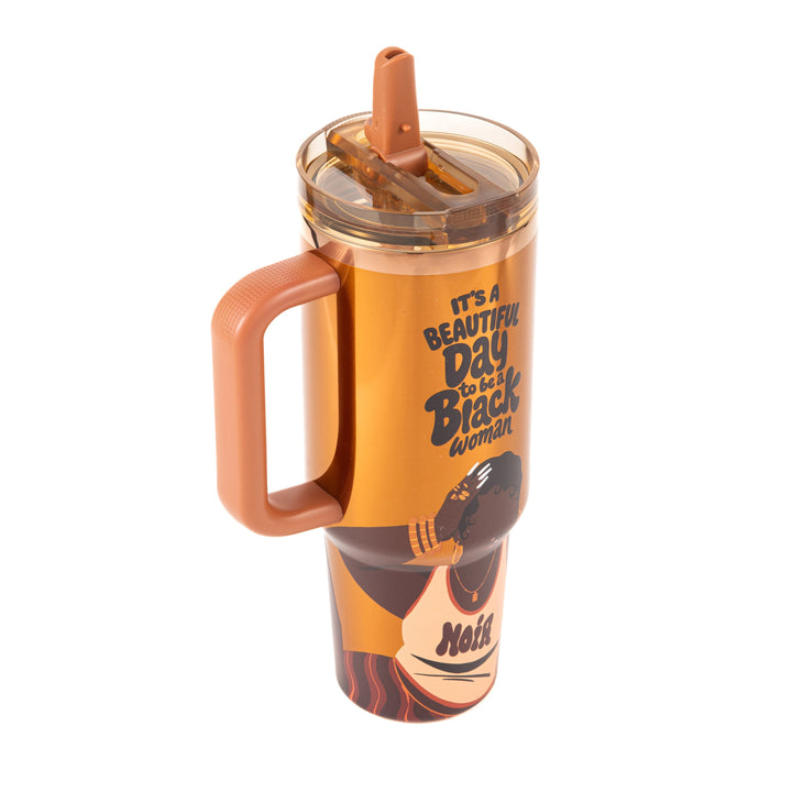 Copper Luxe HydraLock tumbler with an illustrated Black woman with short black curls and a hand on her head, wearing gold bangles, gold hoops, a gold pendant necklace and a white tank reading NOIR, beneath the black affirmation It's a Beautiful Day to Be a Black Woman